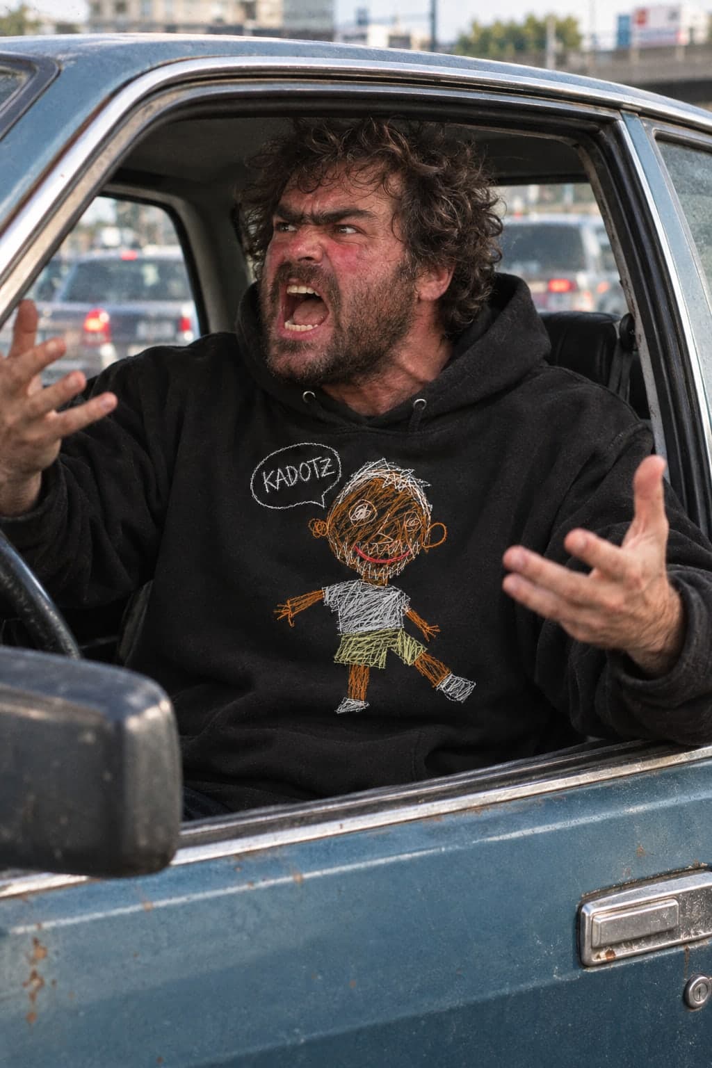 An angry driver in traffic, wearing the KADOTZ hoodie in Black