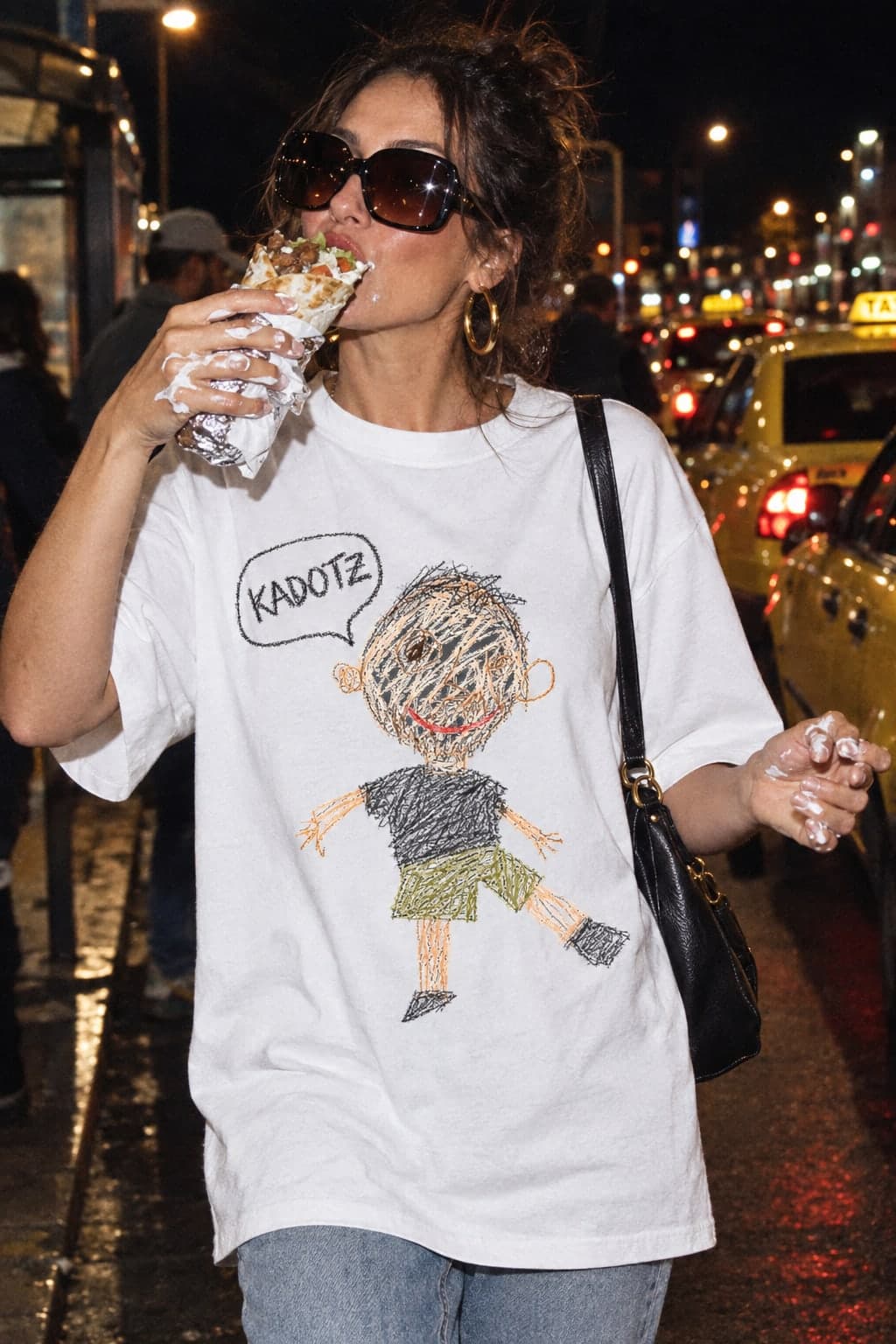 kebab in the taxi queue at 3 a.m., wearing the Women's Relaxed T-Shirt in White (AI-generated model)
